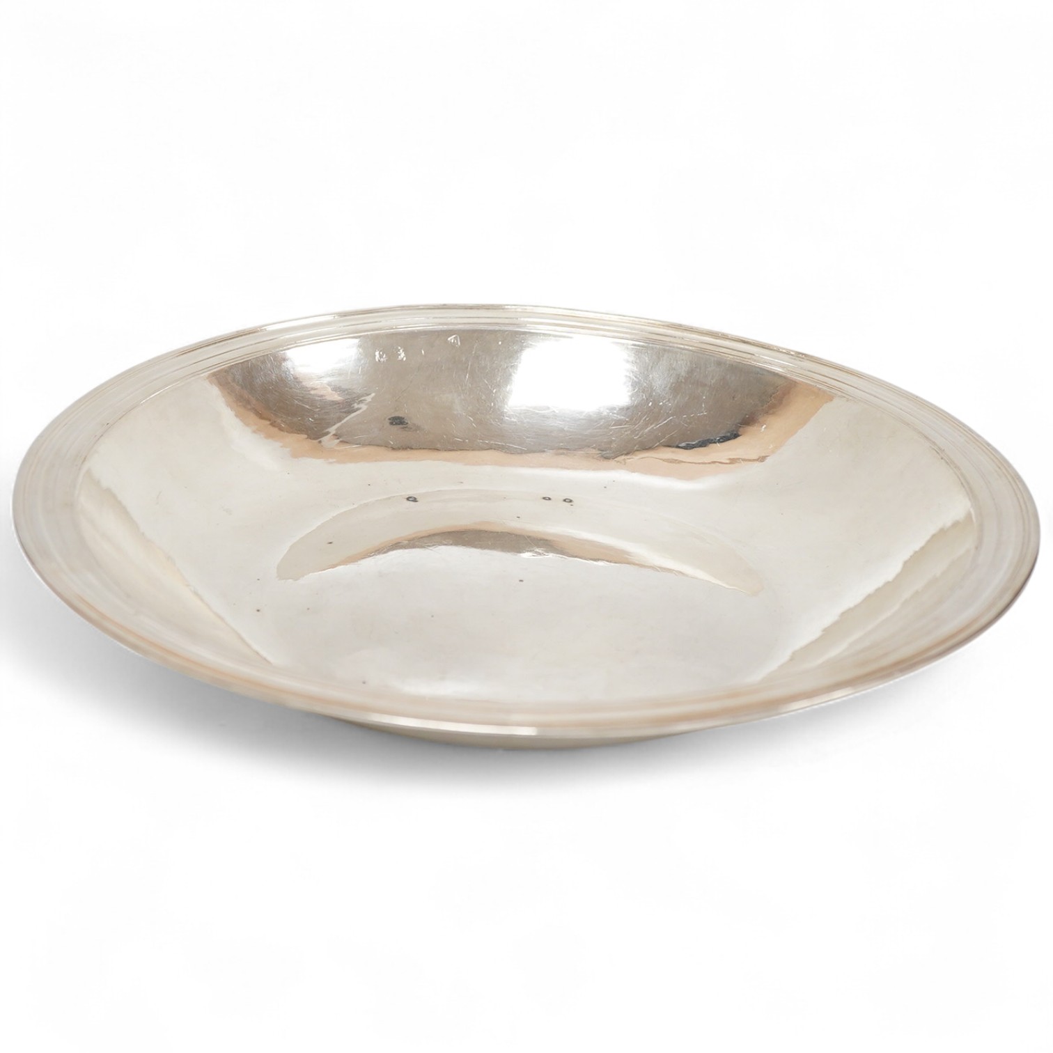 A rare late Charles II silver circular deep plate, makers mark 'D' (Jackson's reference P.139)